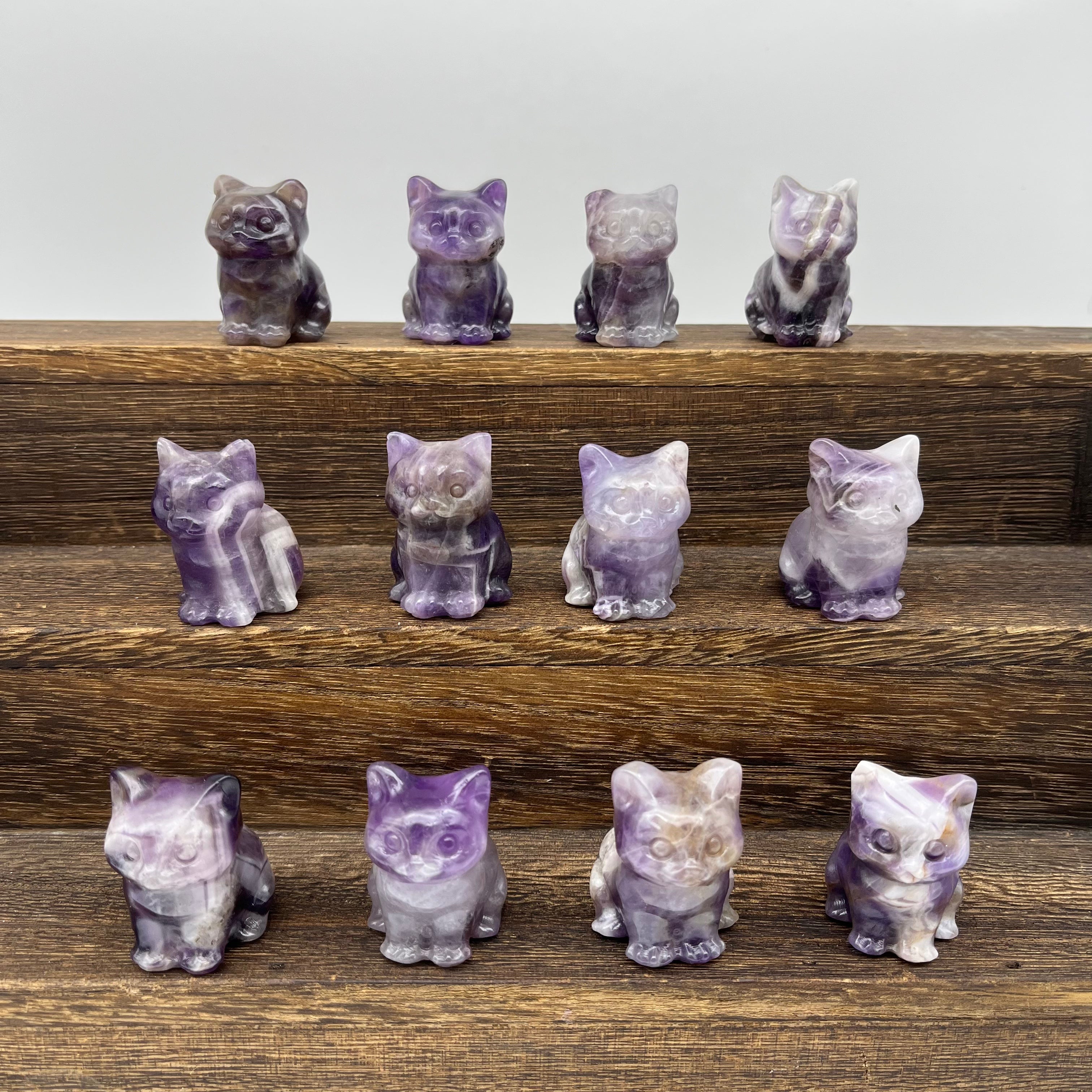 The cat sitting on the dreamy amethyst