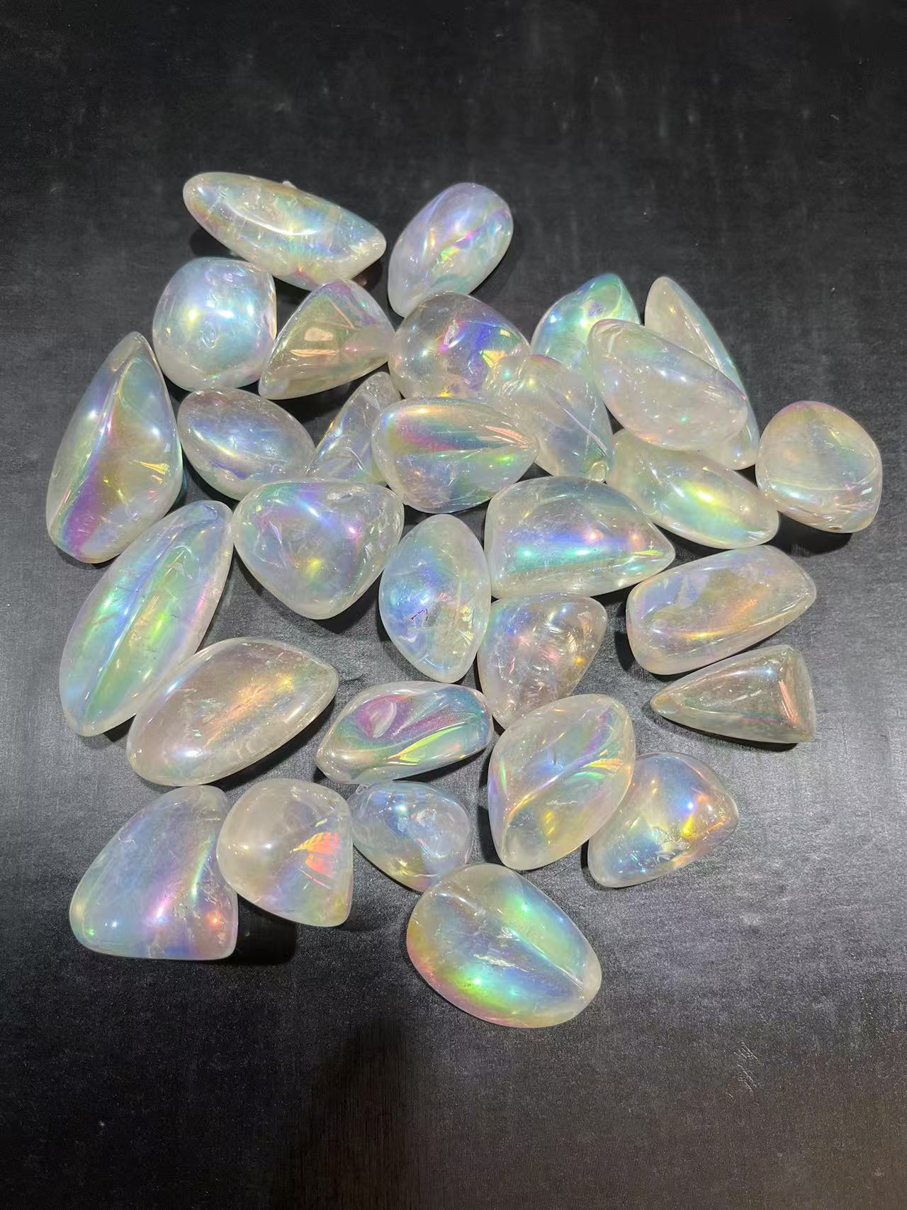 Aura clear quartz tumbles