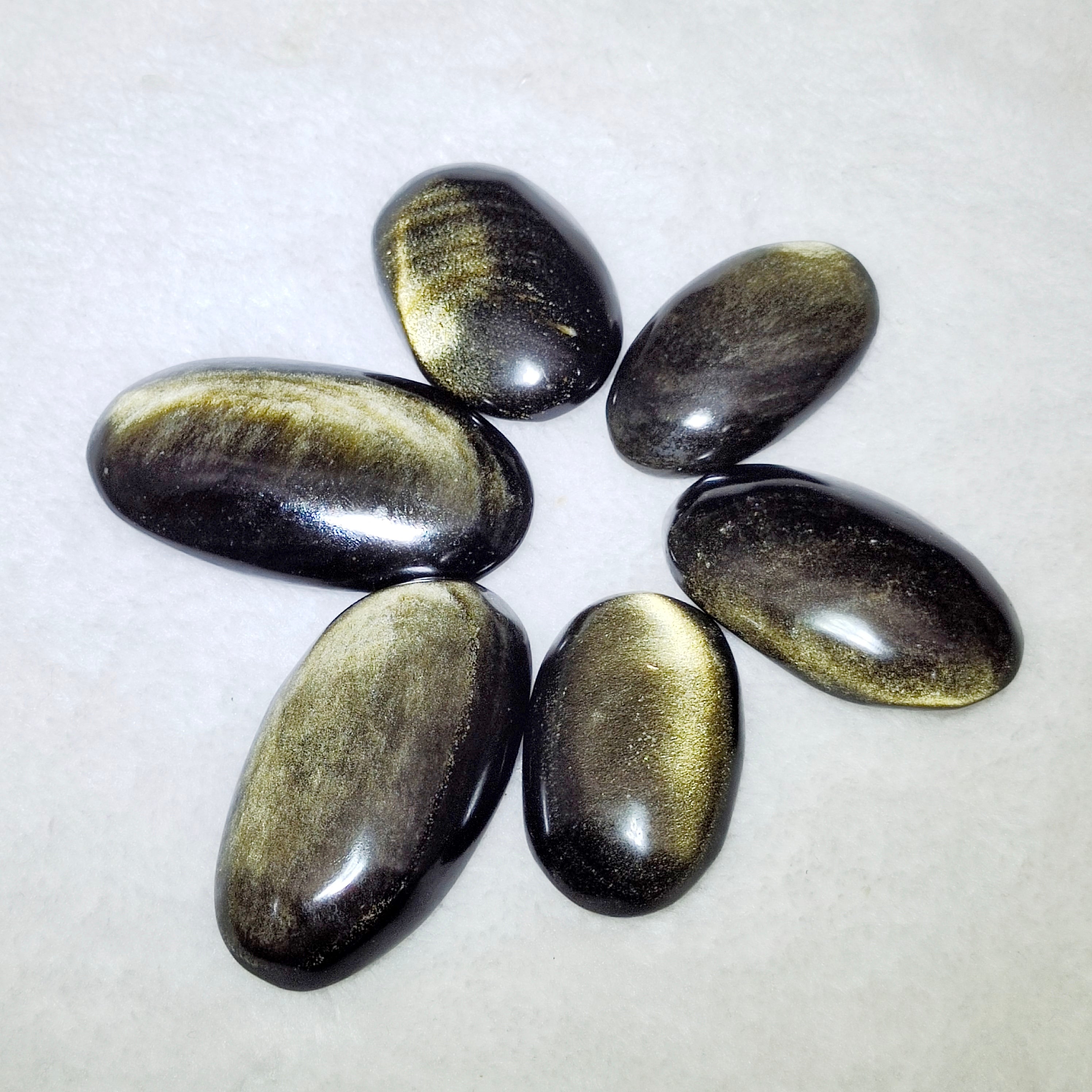 Golden obsidian palmstone