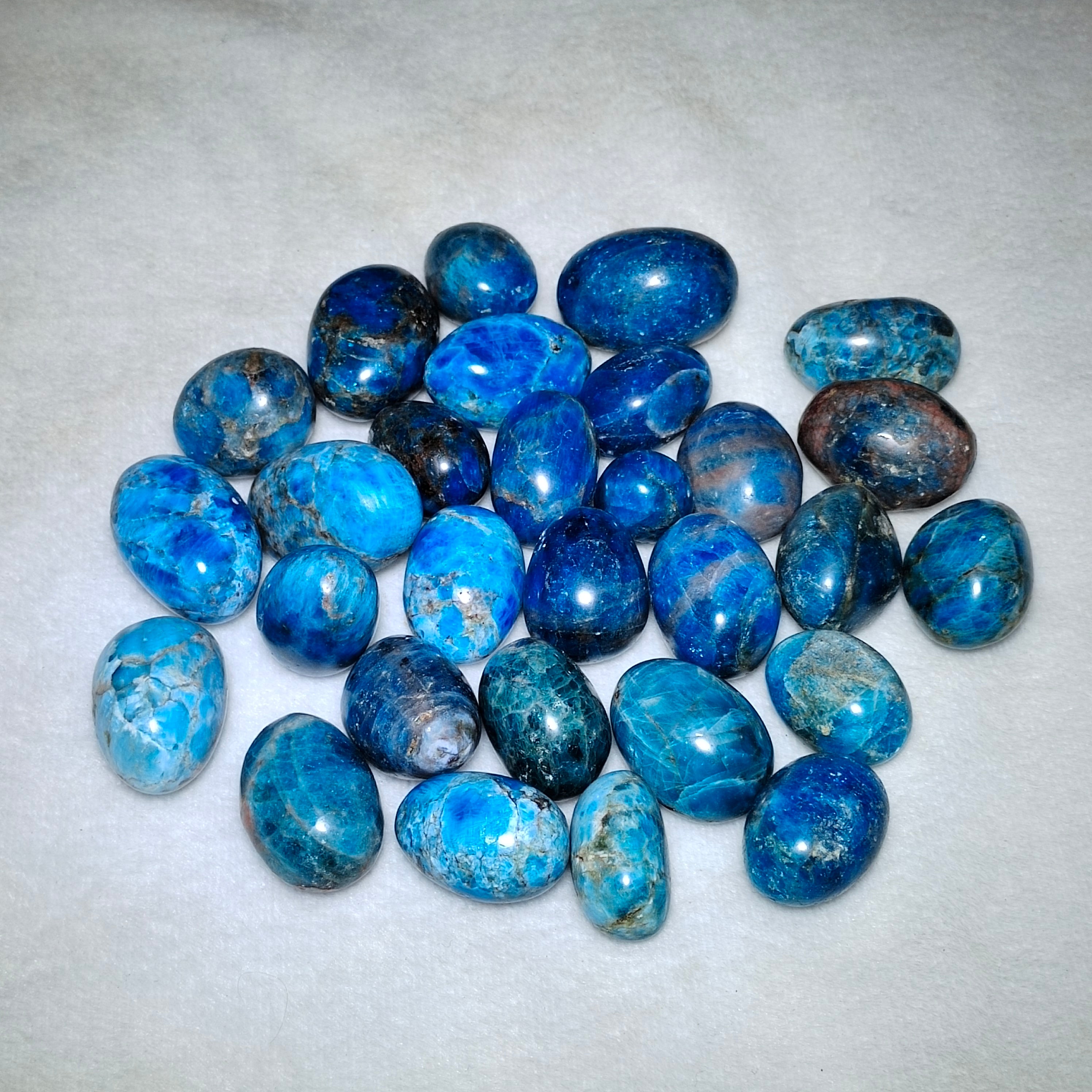 Blue apatite tumbles