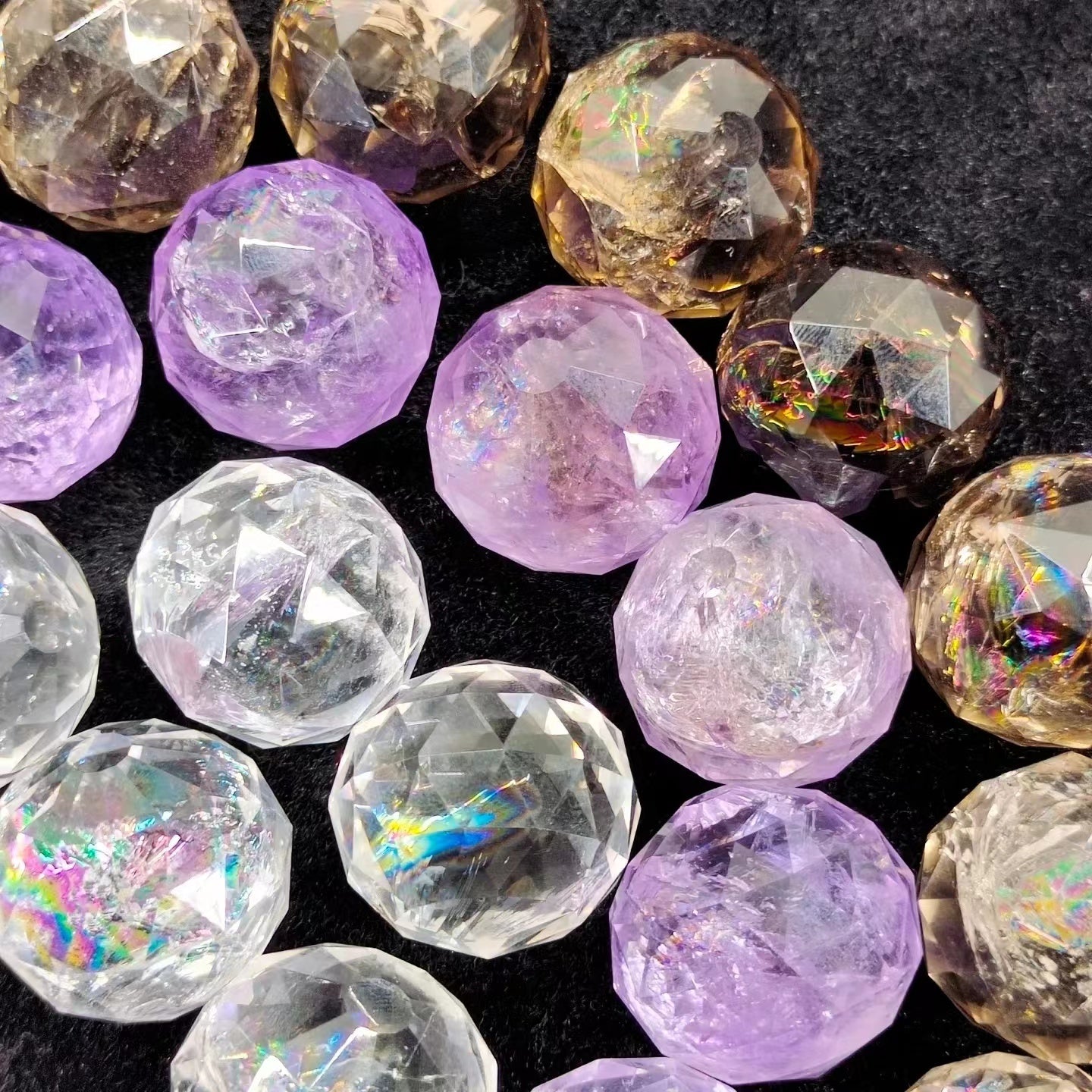 Crystal faceted spheres in various materials