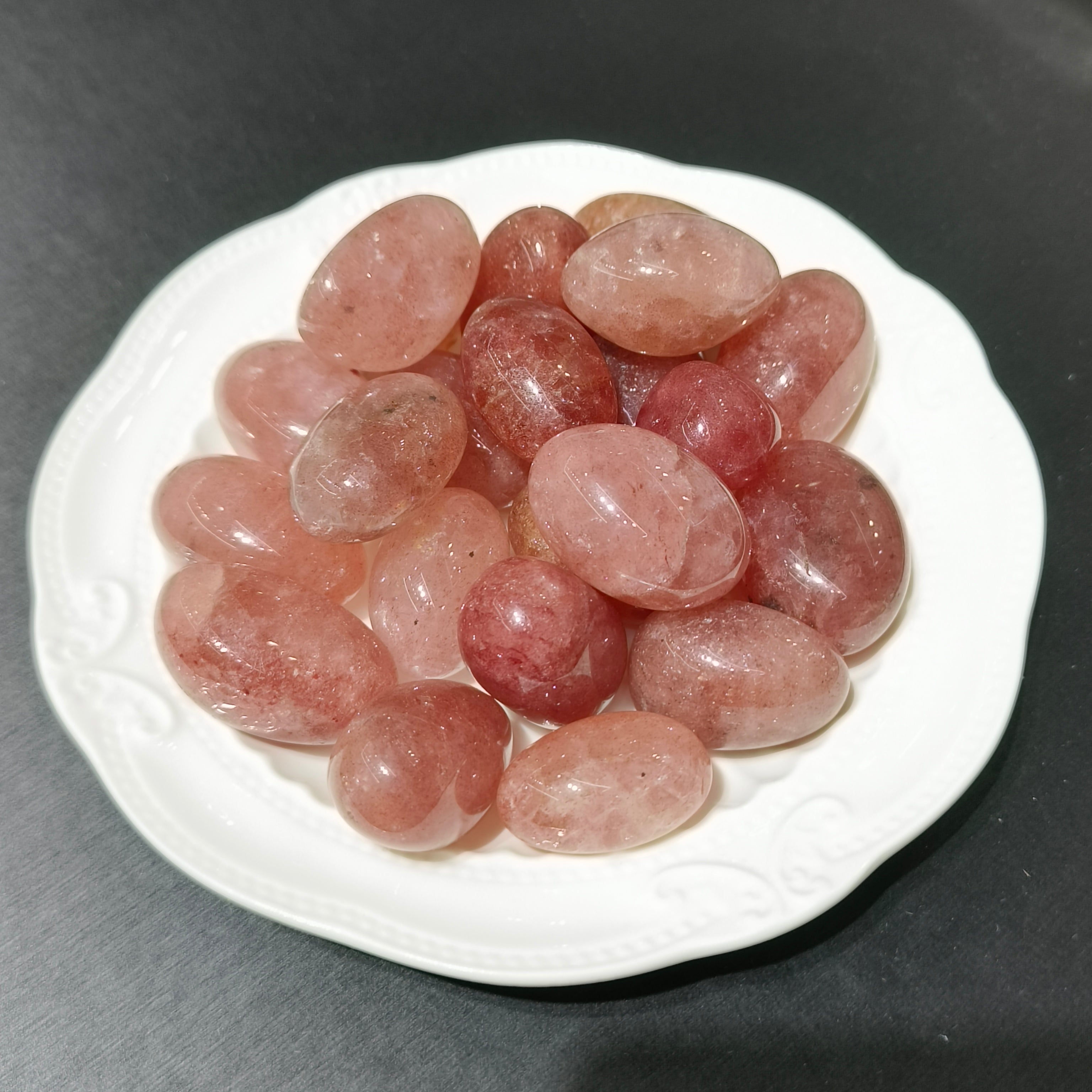 Strawberry quartz tumbles