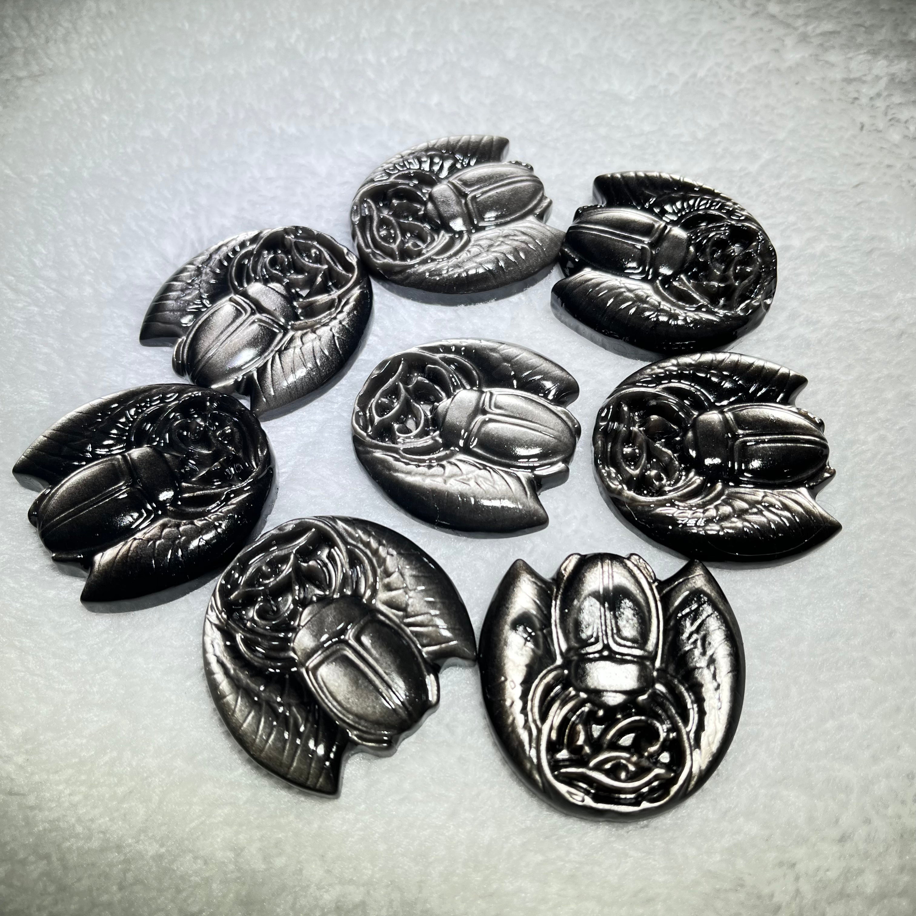 scarab of different materials
