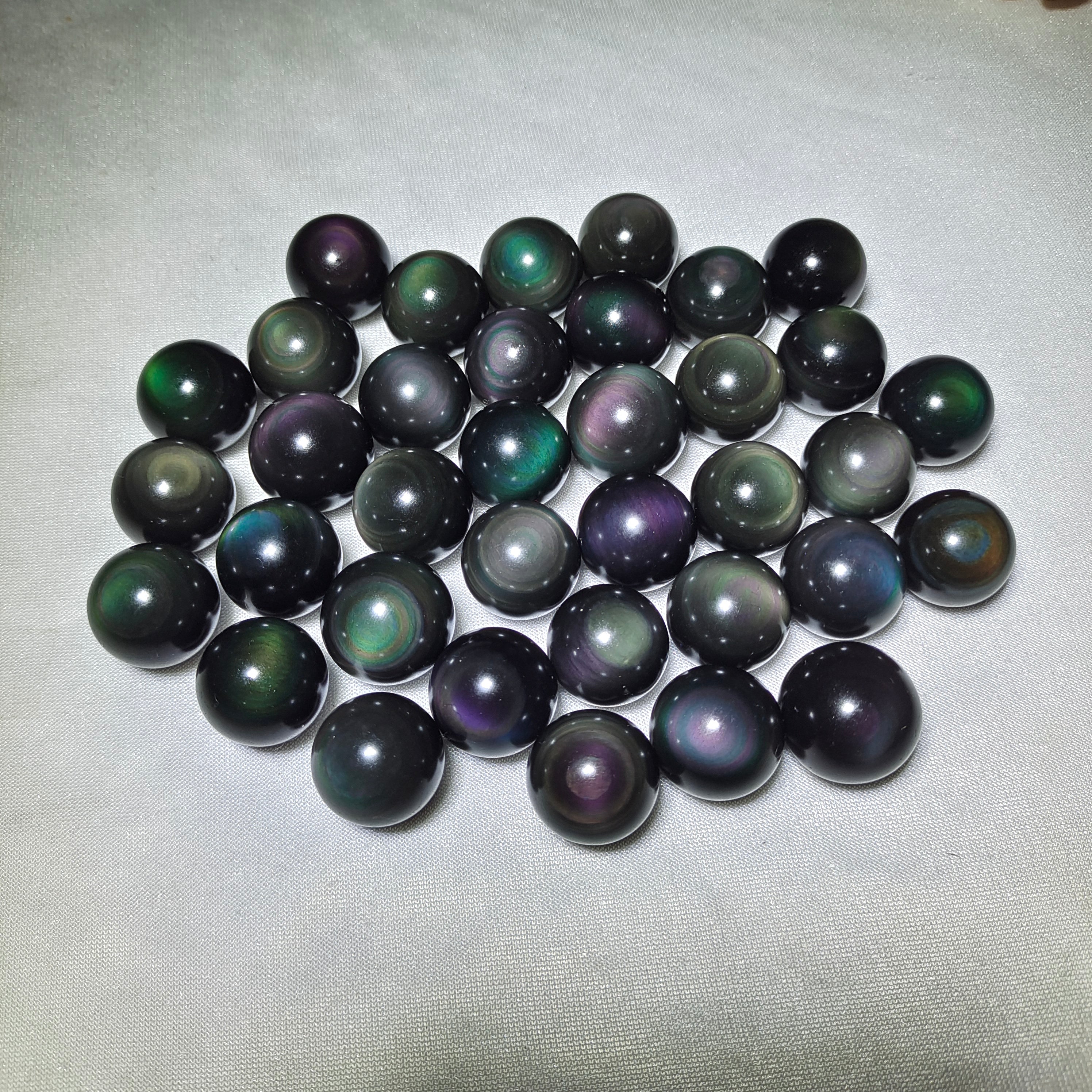 Rainbow obsidian sphere