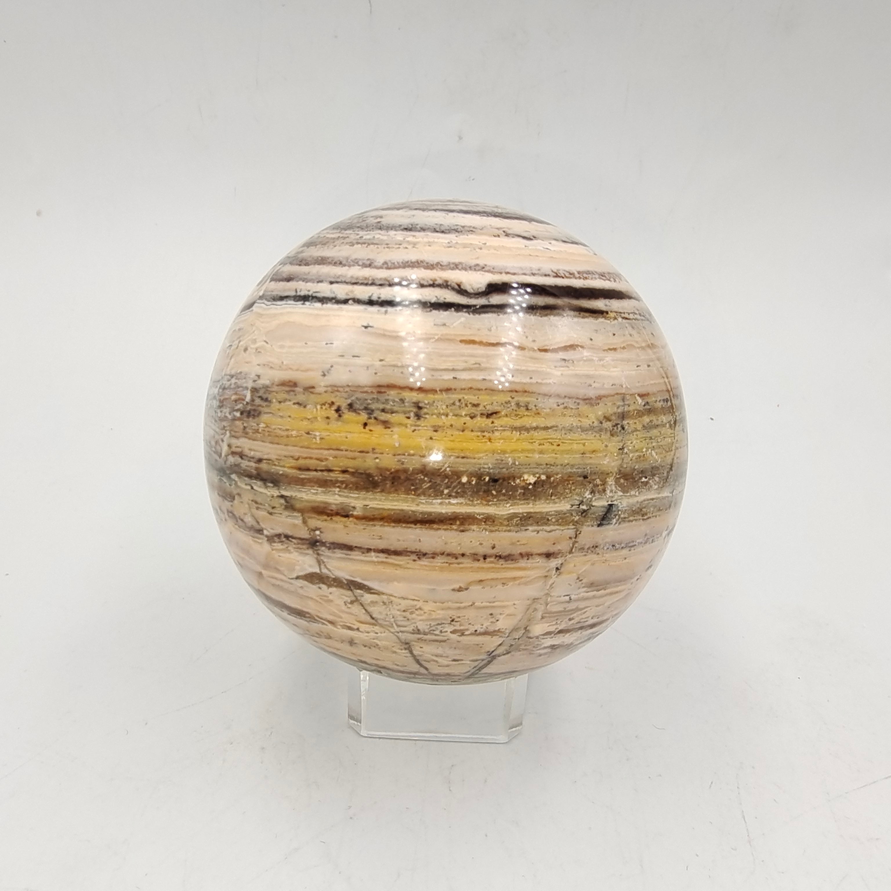 Woodgrain stone sphere